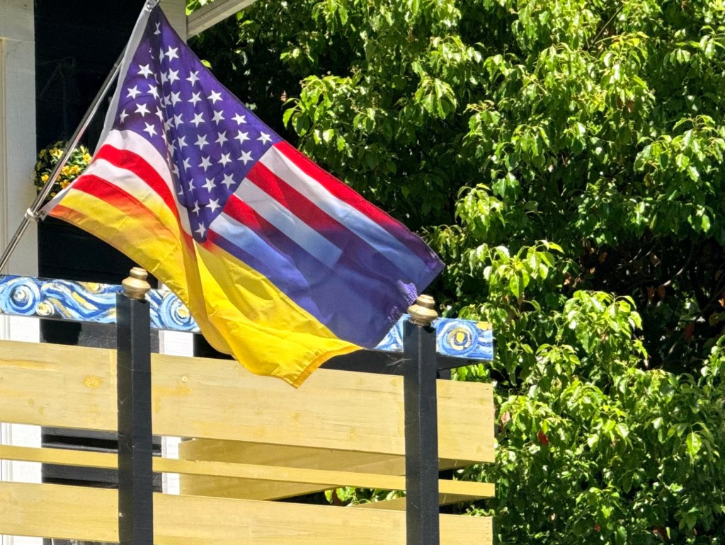 Different countries, same struggle; Union of United States and Ukraine flags, photo